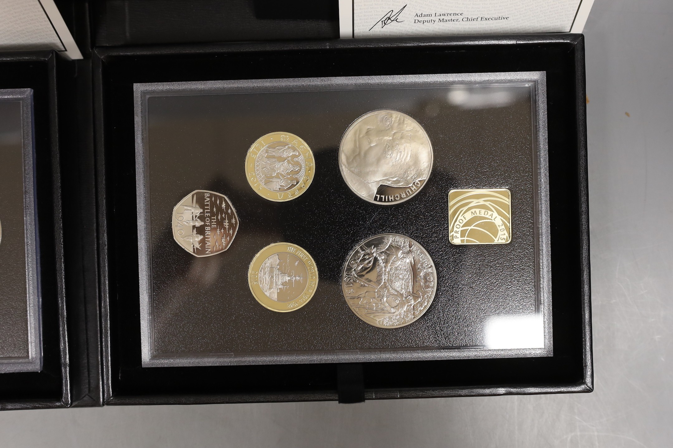 Two UK Royal Mint commemorative edition proof coin sets for 2014 and 2015, cased with certificates